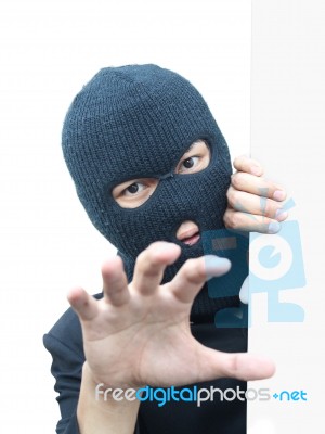 Robber Peeping Stock Photo