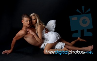 Romantic Couple Lying Together Stock Photo