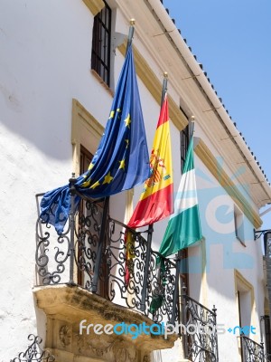 Ronda, Andalucia/spain - May 8 : Flags On A Building In Ronda Sp… Stock Photo