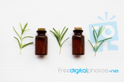 Rosemary Essential Oil On White Stock Photo