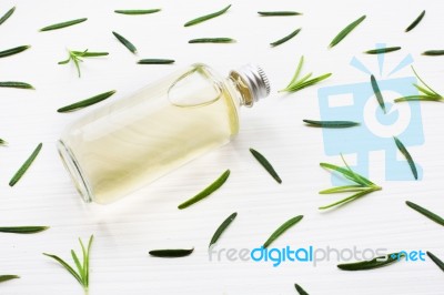 Rosemary Essential Oil On White Stock Photo