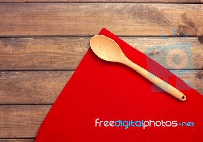 Round Rope Napkin Or Stand, Red Place Mat  And Spoon On A Wooden… Stock Photo