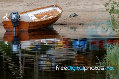 Rowing Boat Moored On Loch Insh Stock Photo