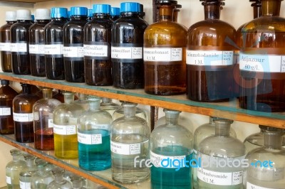 Rows Of Liquid Chemicals In Bottles At Chemistry Stock Photo