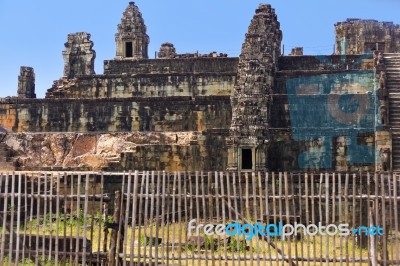 Ruins Of Phnom Bakheng Temple At Angkor Wat Complex Stock Photo