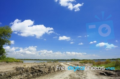 Rural Road With Deep Tire Tracks Stock Photo