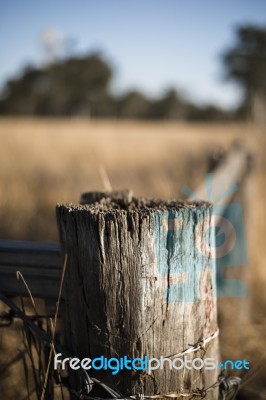 Rusted Sharp Timber And Metal Barb Wire Fence Stock Photo Rusted Sharp Timber And Metal Barb Wire Fence Stock Photo