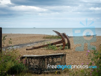 Rusty Anchors On The Beach At Aldeburgh Stock Photo