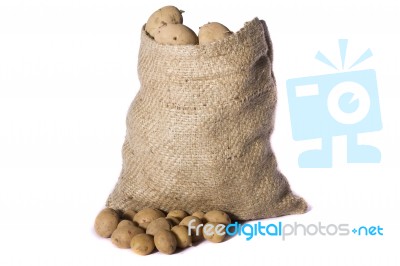 Sack Of Potatoes Stock Photo