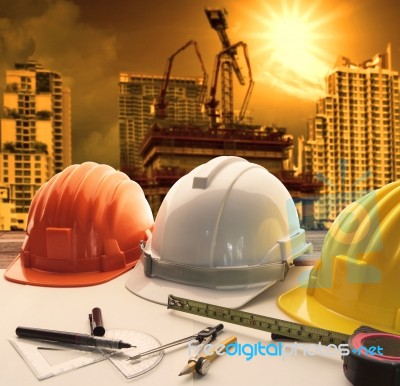 Safety Helmet And Building Construction Industry Business Stock Photo