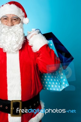 Saint Nicholas Carrying Colorful Shopping Bags Stock Photo