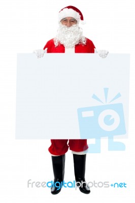 Saint Nicholas Standing Behind Blank Whiteboard Stock Photo
