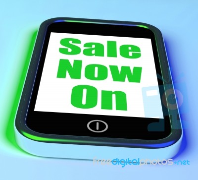 Sale Now On Phone Shows Promotional Savings Or Discounts Stock Image