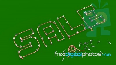 Sale - Rope Outlined To Pins Wording On Green Board Stock Image