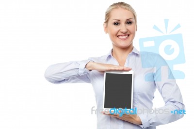 Saleswoman Presenting Touch Pad Device Stock Photo