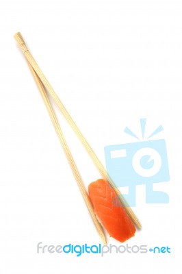 Salmon Sushi With Chopsticks Stock Photo