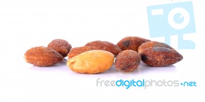 Salted And Roasted Almonds On White Background Stock Photo