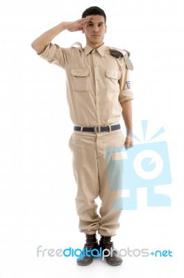 Saluting Young Soldier Stock Photo