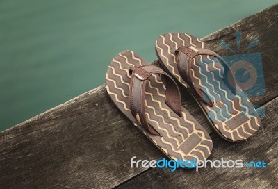 Sandals On Wood Stock Photo