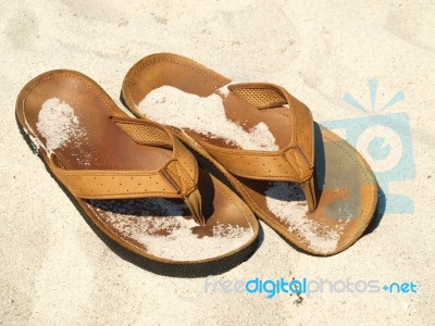 Sandy Flip Flops Stock Photo