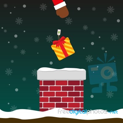 Santa Claus Put Gift Box Into Chimney Stock Image