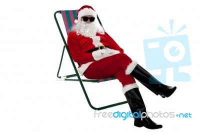 Santa Wearing Shades And Striking Stylish Pose Stock Photo