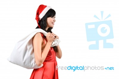 Santa Woman  Holding A White Bag Stock Photo