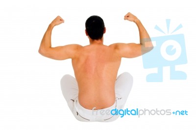 Sat Man Showing Muscles Back Stock Photo