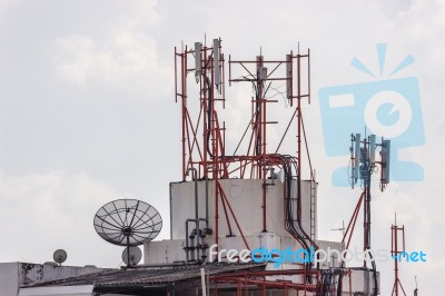 Satellite Damaged And Antenna On The Old Building Stock Photo