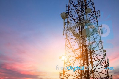 Satellite Dish Network At Sunset Communication Technology Stock Photo