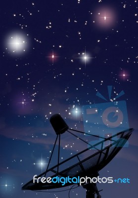 Satellite Dish Under Starry Night Stock Photo