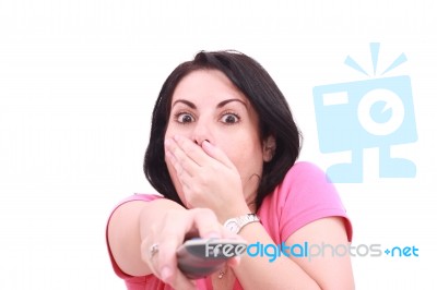 Scared Lady While Watching TV Stock Photo