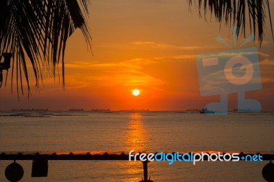 Scenic View Of Beautiful Sunset Above The Sea Stock Photo