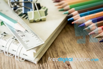 School And Office Supplies On Wood Background. Back To School Stock Photo