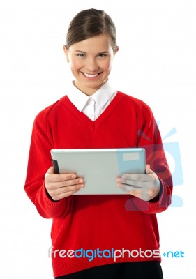 School Girl Holding Tablet Computer Stock Photo