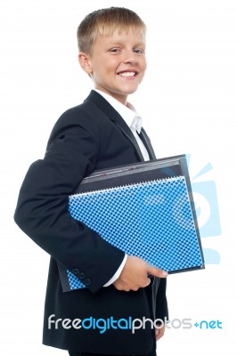 Schoolboy Holding Spiral Note Stock Photo