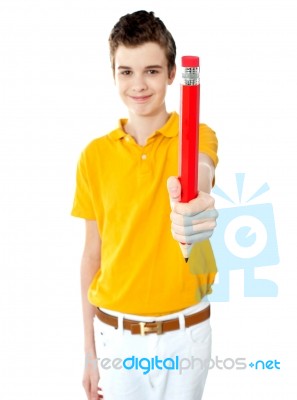 SchoolBoy Showing Pencil Stock Photo