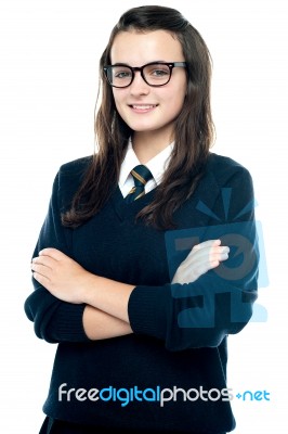 Schoolgirl With Crossed Arms Stock Photo