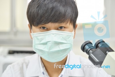 Scientist With Equipment And Science Experiments Stock Photo