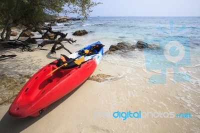 Sea Kayak Canoe On Sea Sand Beach With Beautiful Nature Coast Be… Stock Photo