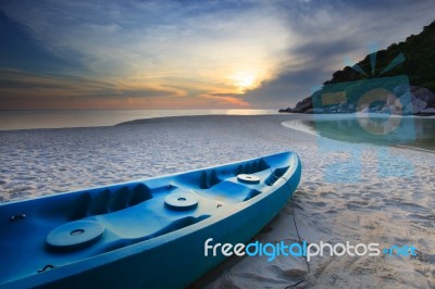 Sea Kayak On Sand Beach Stock Photo