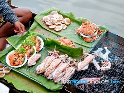 Seafood On Charcoal Grilled Stock Photo