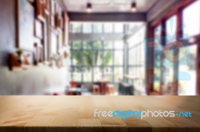 Selected Focus Empty Brown Wooden Table And Coffee Shop Or Resta… Stock Photo