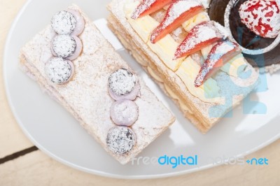 Selection Of Fresh Cream Cake Dessert Plate Stock Photo