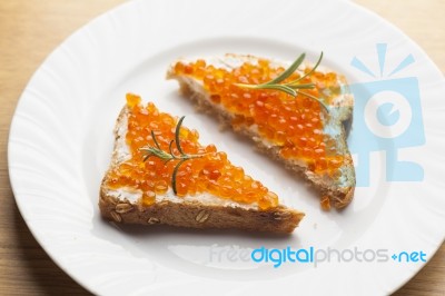 Sendwich With Caviar On Bread Decorated With Rosemery Stock Photo