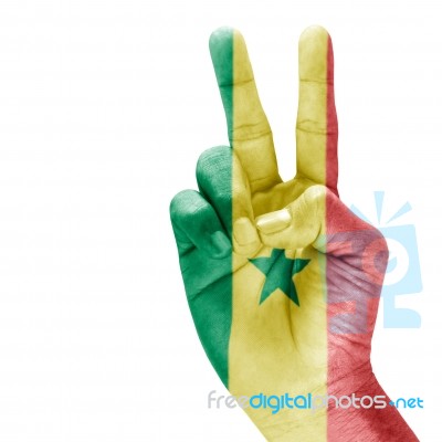 Senegal Flag On Victory Hand Stock Photo