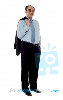 Senior Businessman With His Jacket Stock Photo
