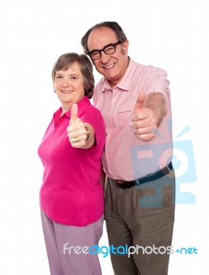 Senior Couple Gesturing Thumbs Up Stock Photo