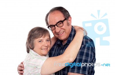 Senior Couple Hugging Each Other Stock Photo