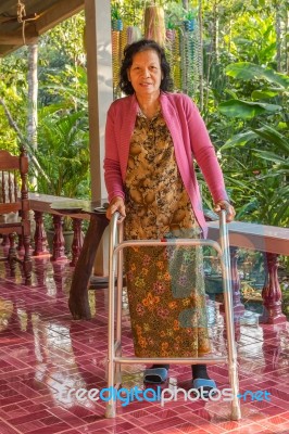 Senior Disabled Woman With Walker Stock Photo